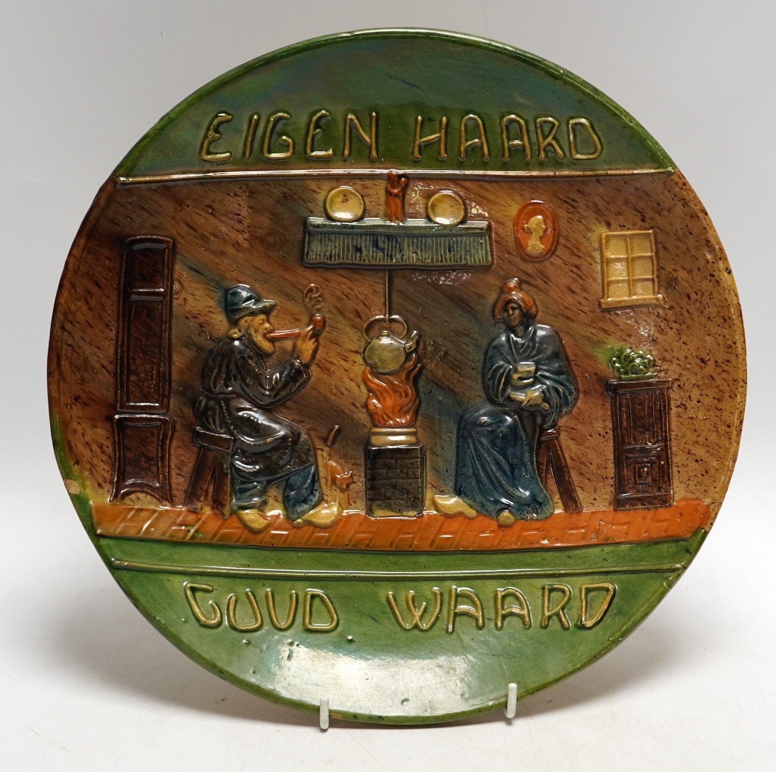 A Dutch pottery proverb plate, circa 1900, 31cm
